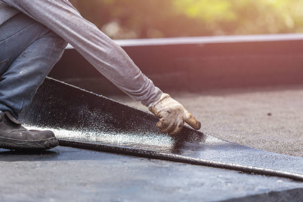 Professional Basement Waterproofing technician working in Mooreland, IN